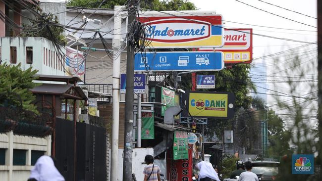 Pernah Heran Kenapa Indomaret dan Alfamart Selalu Berdampingan? Ini 4 Alasannya 
